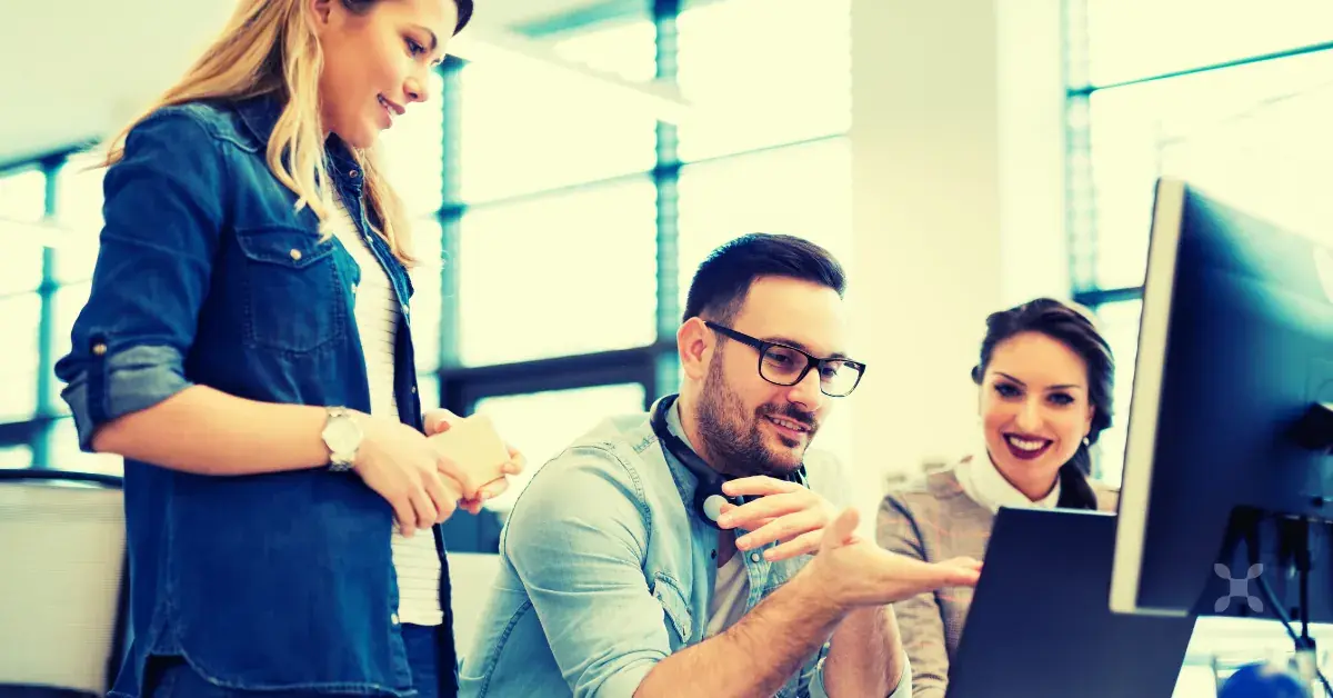 A team reviewing the benefits of cloud ERP software